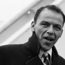 Frank Sinatra boarding a flight from London to New York in 1952