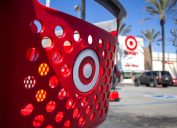 A shopping cart is parked in front of the Target department store