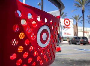 A shopping cart is parked in front of the Target department store