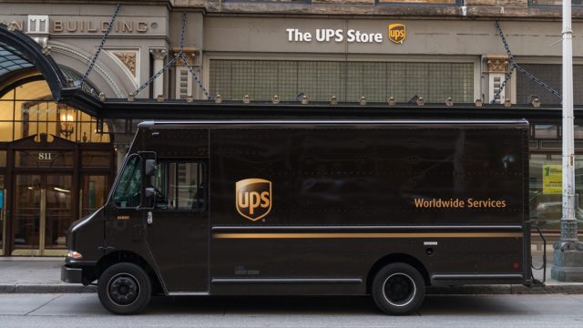 UPS Truck at the UPS Store on 1st ave in Downtown Seattle late in the day.