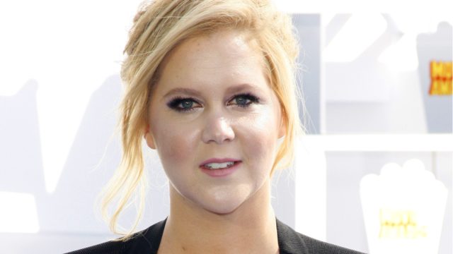 amy schumer in a black and white dress
