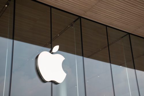 The logo of Apple brand in front ot First Apple store in Bangkok, Thailand.