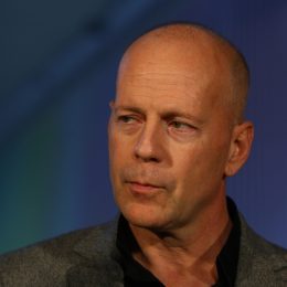 A closeup of Bruce Willis during a premier