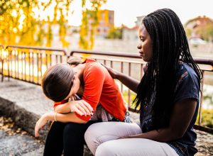 friend comforting someone