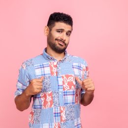 selfish man pointing to himself