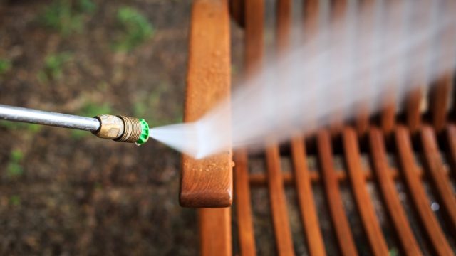 spraying patio furniture