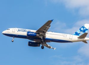 Airbus A320 JetBlue approaches John F. Kennedy International Airport in New York, NY on November 3, 2013. A320 was the first narrow body airliner from Airbus. It is the biggest competition to Boeing 737.