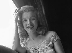 Marilyn Monroe on a train in 1949