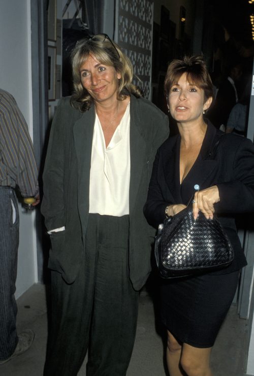 Penny Marshall and Carrie Fisher at "Angel Art" Auction to Benefit Project Angel in 1990