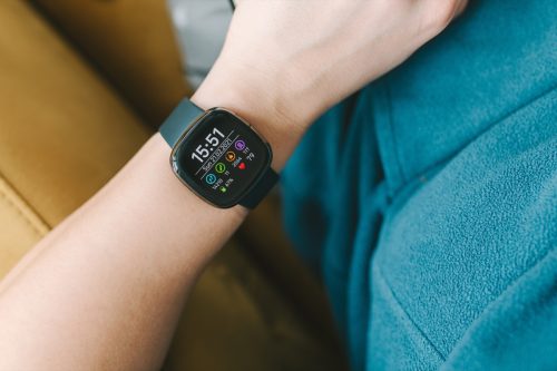fitbit smartwatch on wrist