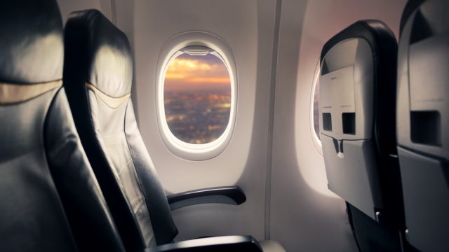Airplane Interior with a Window Seat