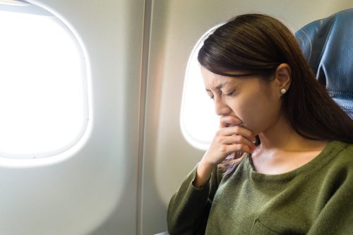 Woman with a Fear of Flying on a Plane
