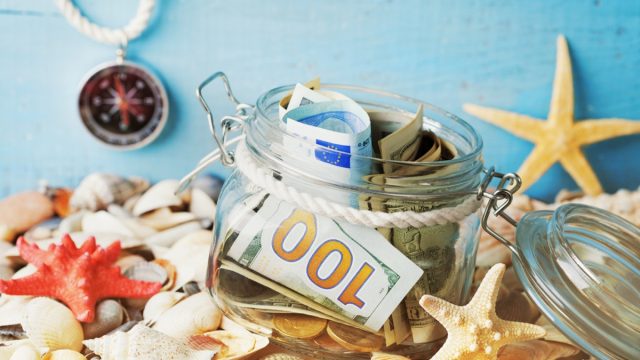 Jar Full of Money on Top of Starfish