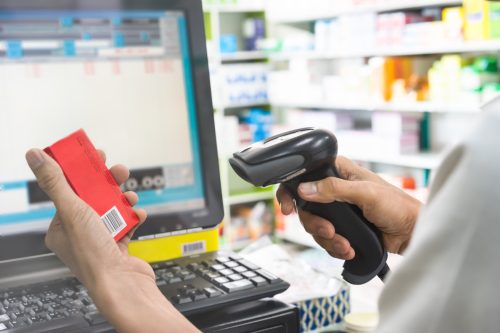 cashier scanning price on product