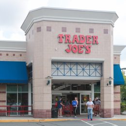 Trader Joe's exterior and sign. Trader Joe's is an American privately held chain of specialty grocery stores headquartered in Monrovia, California. - Image