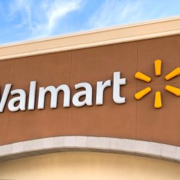 The exterior sign of a Walmart store