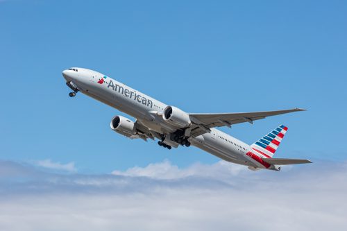 An American Airlines plane taking off into the sky