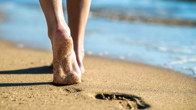 feet walking on sand