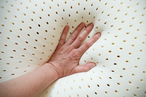 Hand on Top of Cooling Pillow