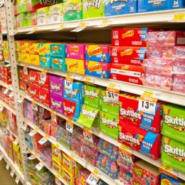candy aisle showing skittles and starburst
