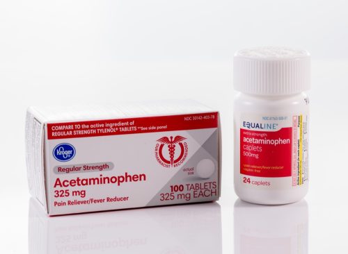 Un pachet de acetaminofen generic și o sticlă de pastile