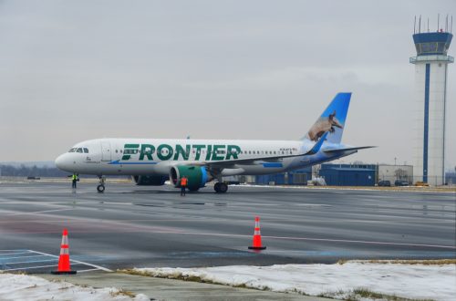 frontier airlines plane at New Castle airport