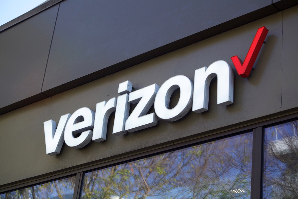 closeup of the Verizon logo on a storefront