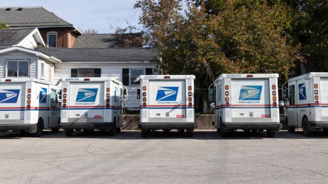 parked usps mail trucks