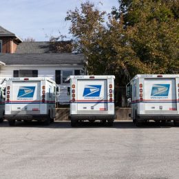 parked usps mail trucks