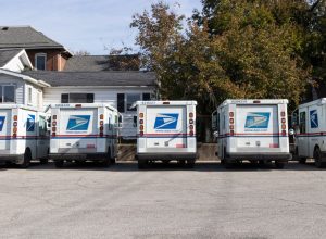 parked usps mail trucks