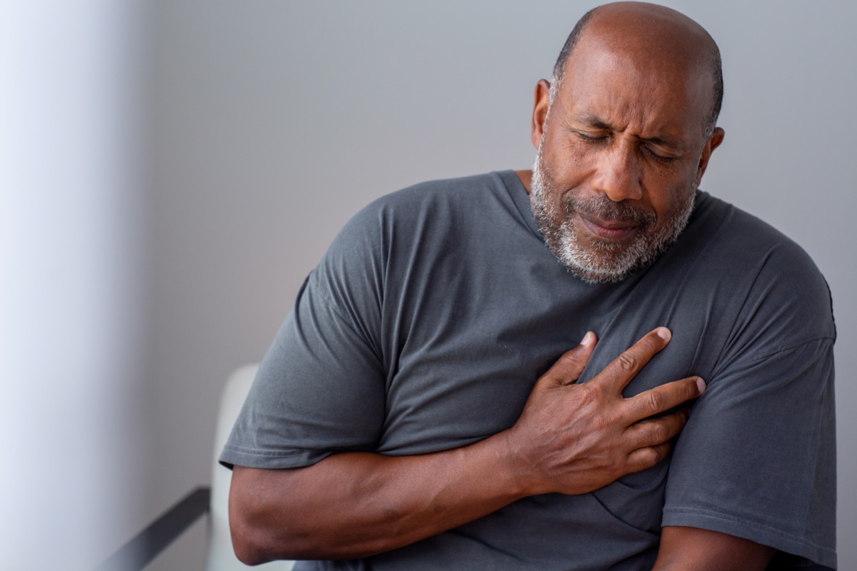 older man having chest pain