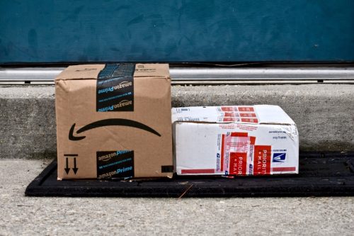 usps and amazon package on doorstep