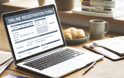 Open Laptop to an Online Registration Page