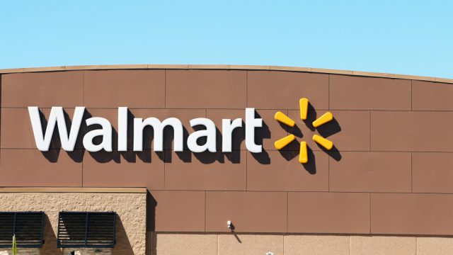 The exterior signage of a Walmart store