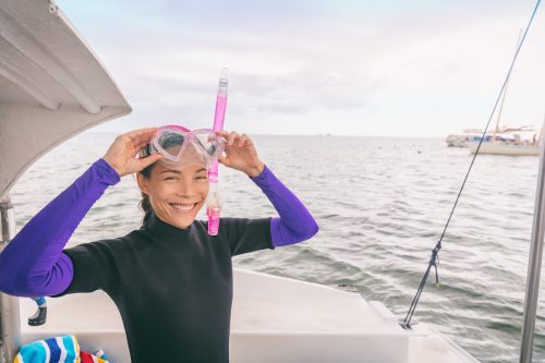 woman scuba from a boat in Miami