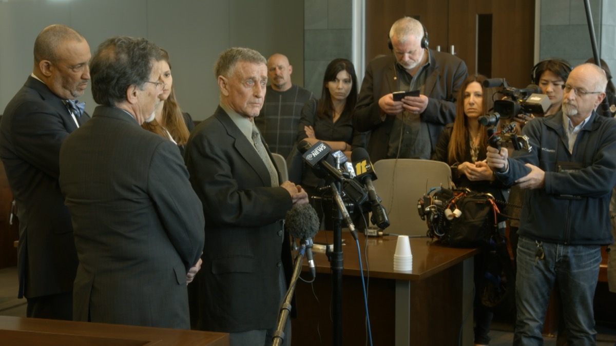 Michael Peterson with his legal team in The Staircase