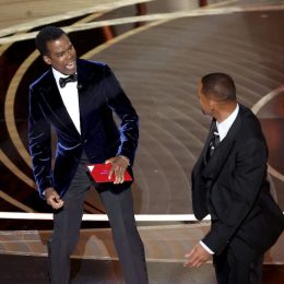 Chris Rock and Will Smith on stage at the 2022 Oscars