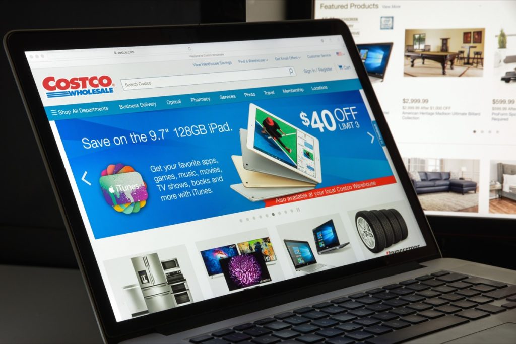 Costco.com website homepage. It is the largest American membership-only warehouse club. Costco logo visible.