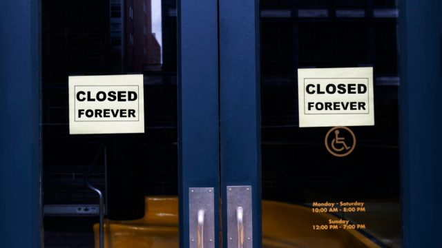 store closed with signs