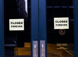 store closed with signs