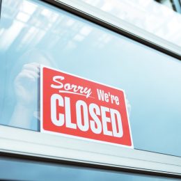 store closed sign in window