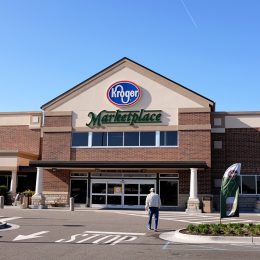 On a beautiful morning a customer walks into the Kroger Superstore to do some shopping.