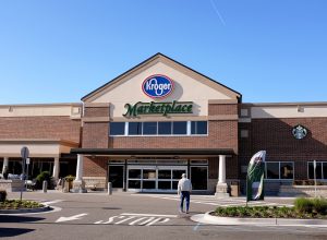 On a beautiful morning a customer walks into the Kroger Superstore to do some shopping.