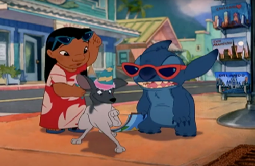 Lilo, Stitch, and a dog in "Lilo & Stitch"