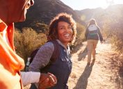 people hiking and smiling