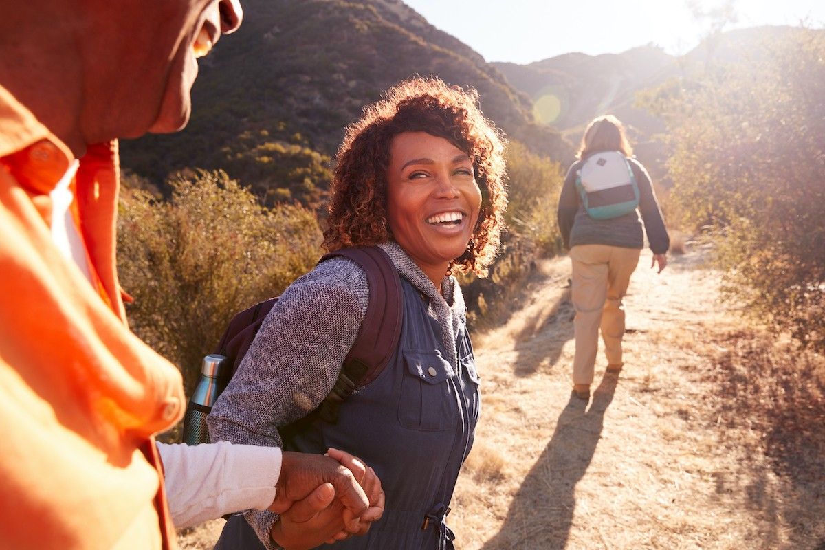 people hiking and smiling