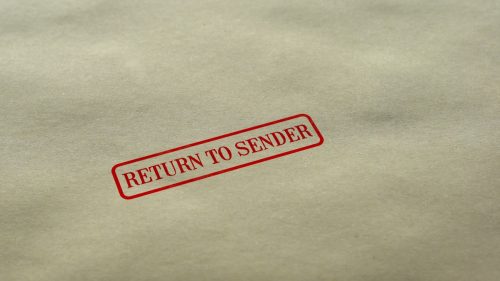 Return to Sender seal stamped on blank paper background, delivery failed