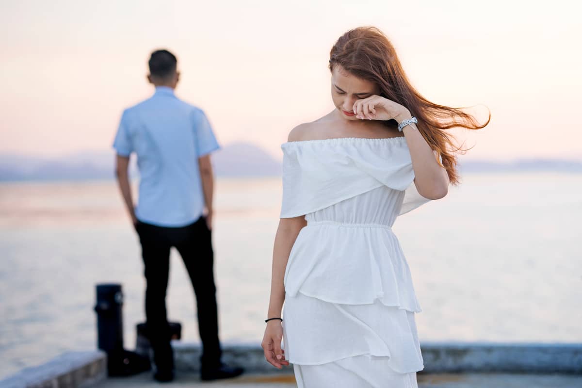 Wassana Panapute / Shutterstock. i love you quotes: woman in white dress cr...