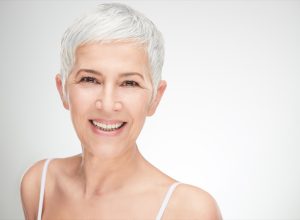 Woman with Gray Pixie Cut