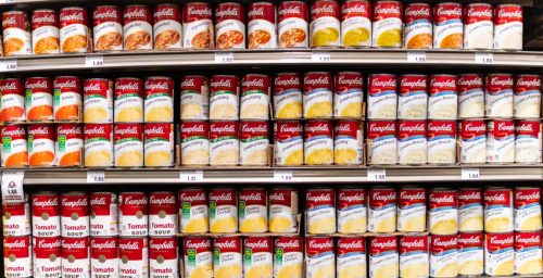 Rows of Campbell's soups in a grocery store
